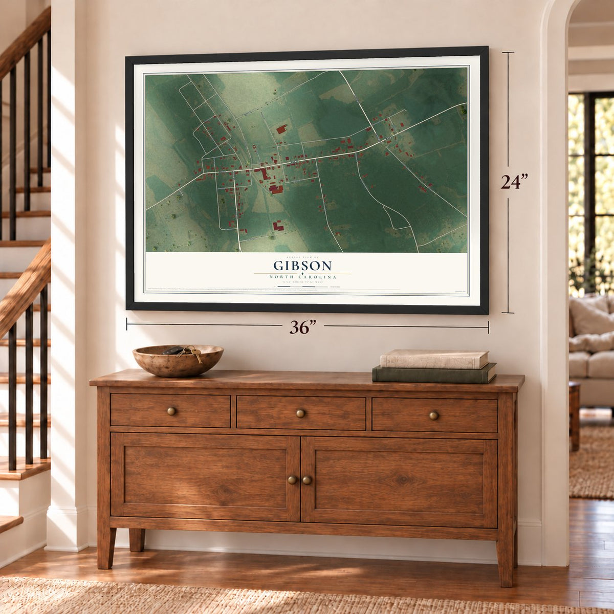 Gibson, North Carolina map, 24 x 36 inch print in a black frame above a dresser by a staircase