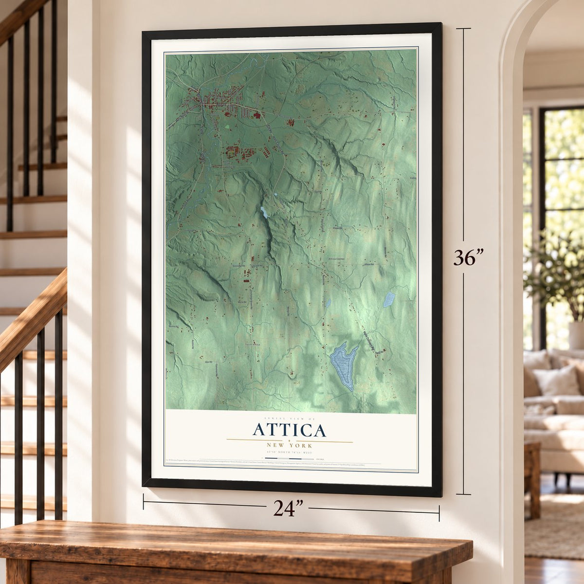 Attica, New York map, 24 x 36 inch print in a black frame by a staircase