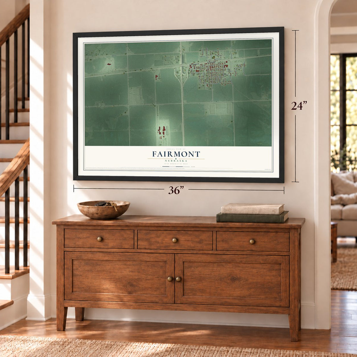 Fairmont, Nebraska map, 24 x 36 inch print in a black frame above a dresser by a staircase