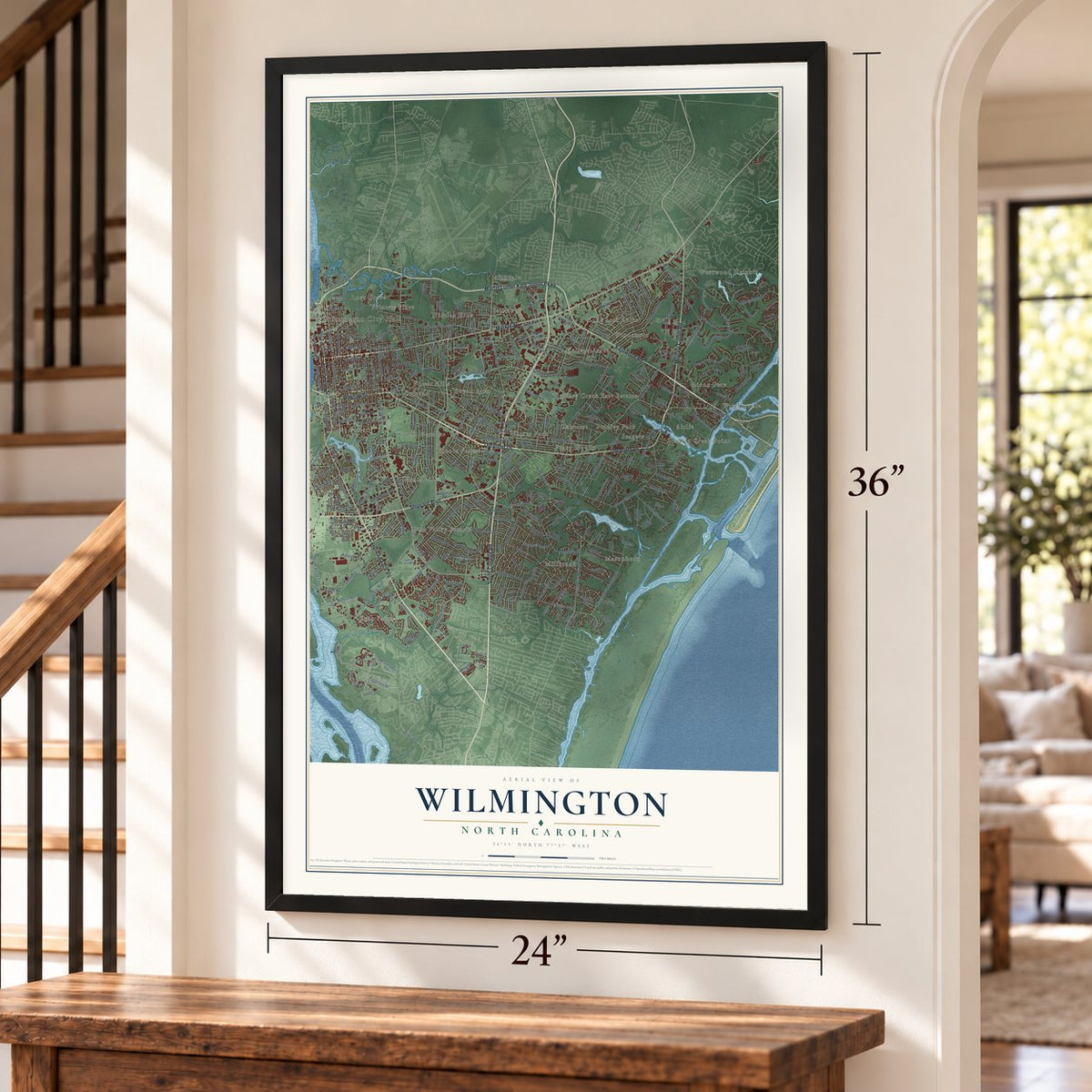 Wilmington, North Carolina map, 24 x 36 inch print in a black frame by a staircase