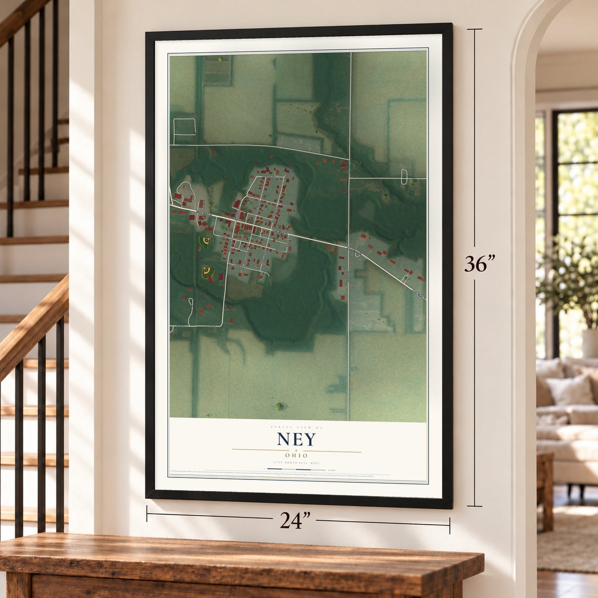 Ney, Ohio map, 24 x 36 inch print in a black frame by a staircase