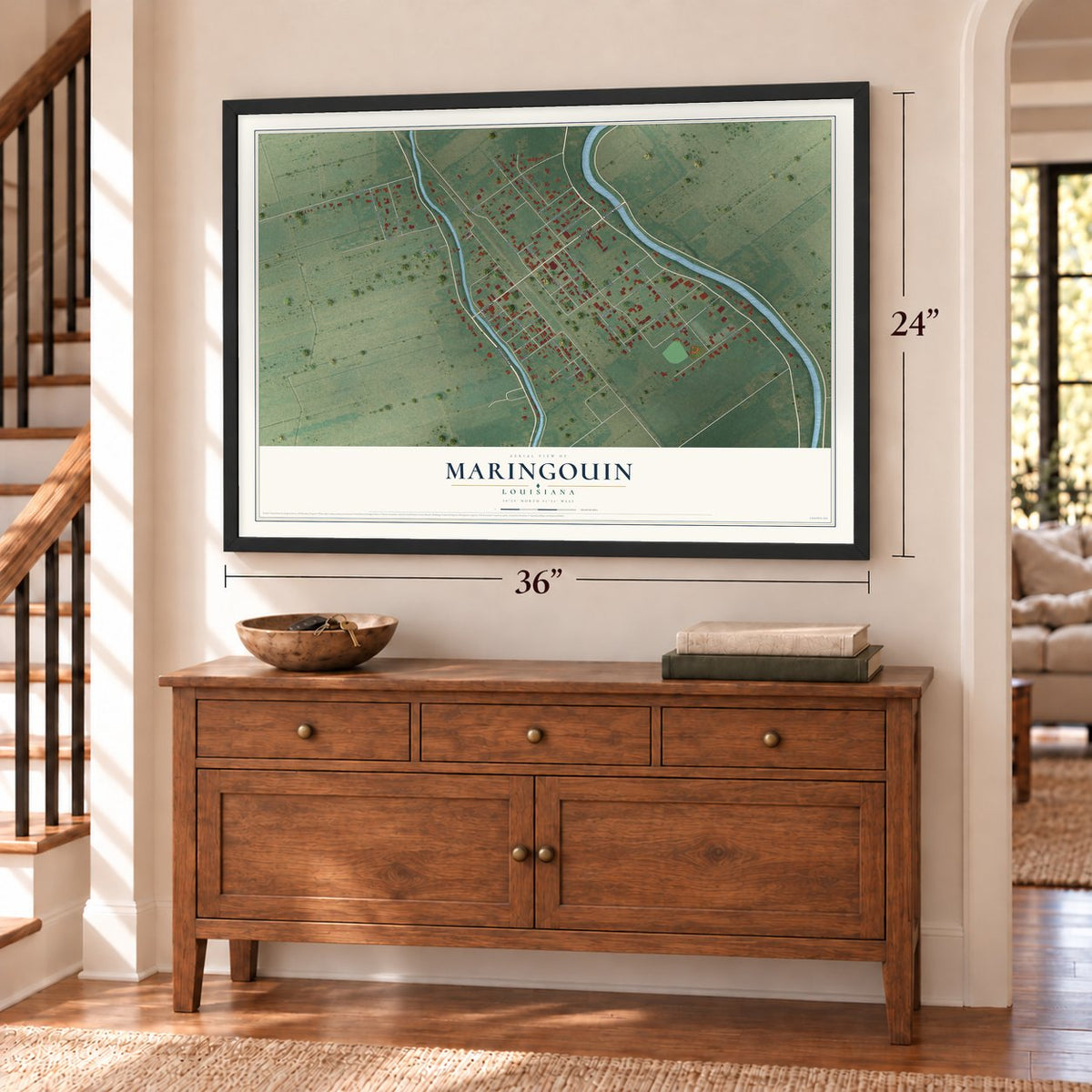Maringouin, Louisiana map, 24 x 36 inch print in a black frame above a dresser by a staircase