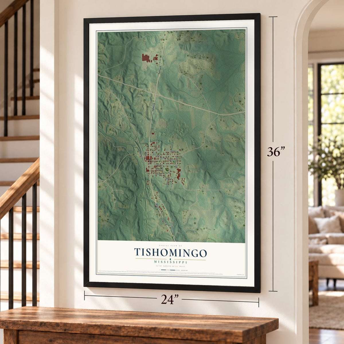 Tishomingo, Mississippi map, 24 x 36 inch print in a black frame by a staircase