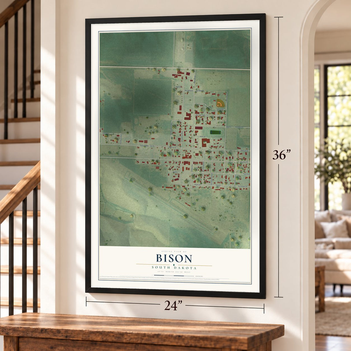 Bison, South Dakota map, 24 x 36 inch print in a black frame by a staircase