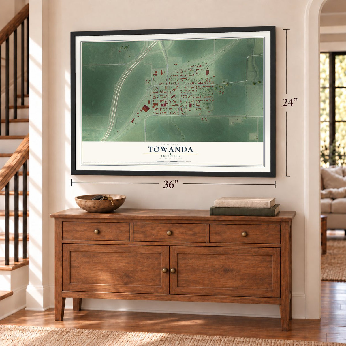 Towanda, Illinois map, 24 x 36 inch print in a black frame above a dresser by a staircase