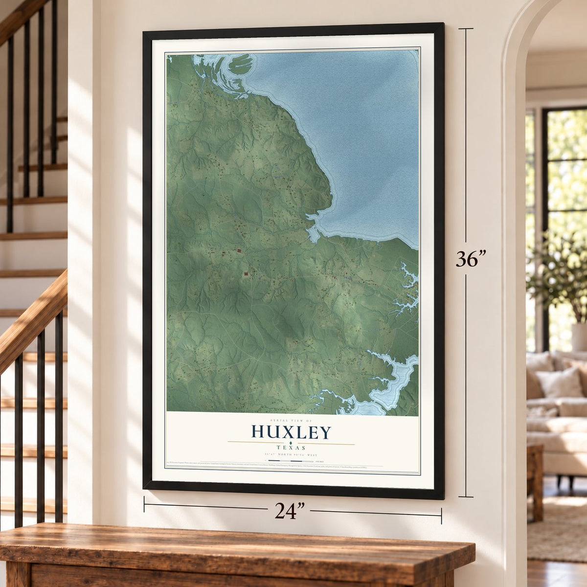 Huxley, Texas map, 24 x 36 inch print in a black frame by a staircase