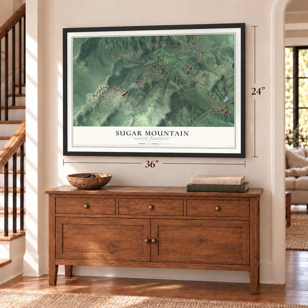 Sugar Mountain, North Carolina map, 24 x 36 inch print in a black frame above a dresser by a staircase