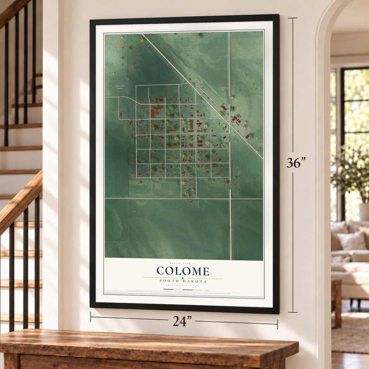 Colome, South Dakota map, 24 x 36 inch print in a black frame by a staircase