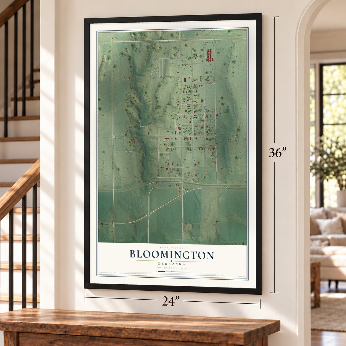 Bloomington, Nebraska map, 24 x 36 inch print in a black frame by a staircase