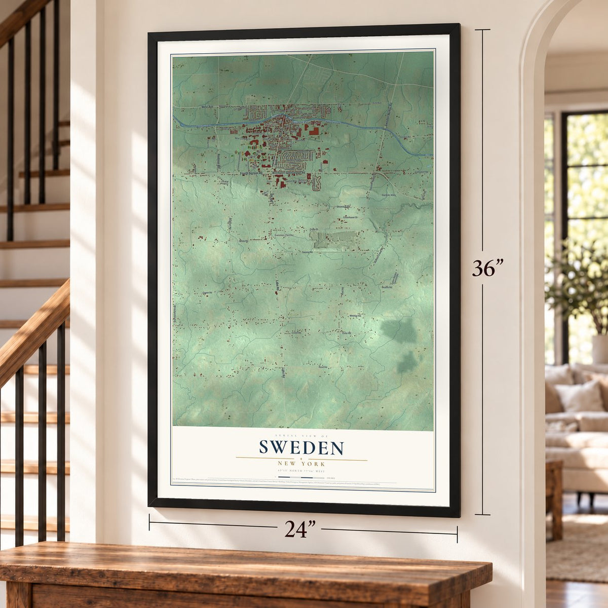 Sweden, New York map, 24 x 36 inch print in a black frame by a staircase