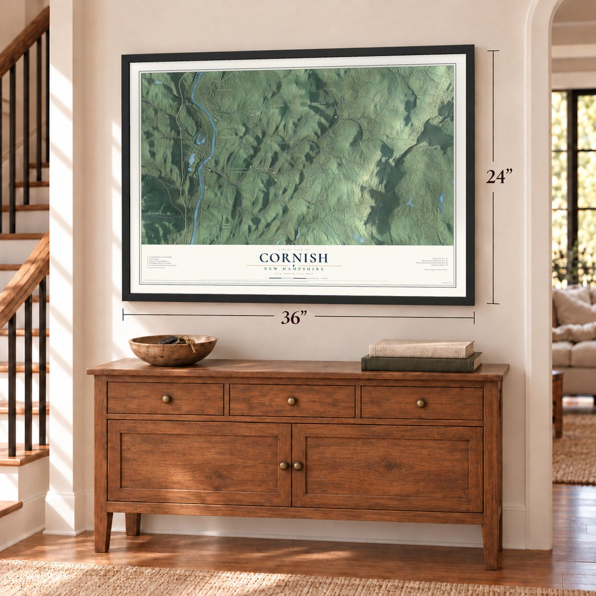 Cornish, New Hampshire map, 24 x 36 inch print in a black frame above a dresser by a staircase
