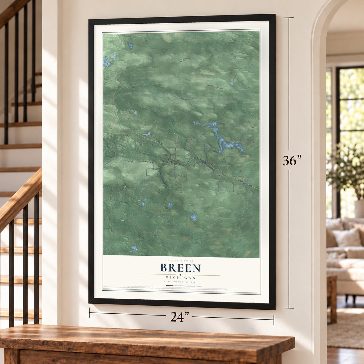 Breen, Michigan map, 24 x 36 inch print in a black frame by a staircase