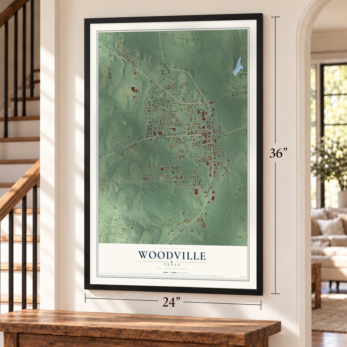 Woodville, Texas map, 24 x 36 inch print in a black frame by a staircase