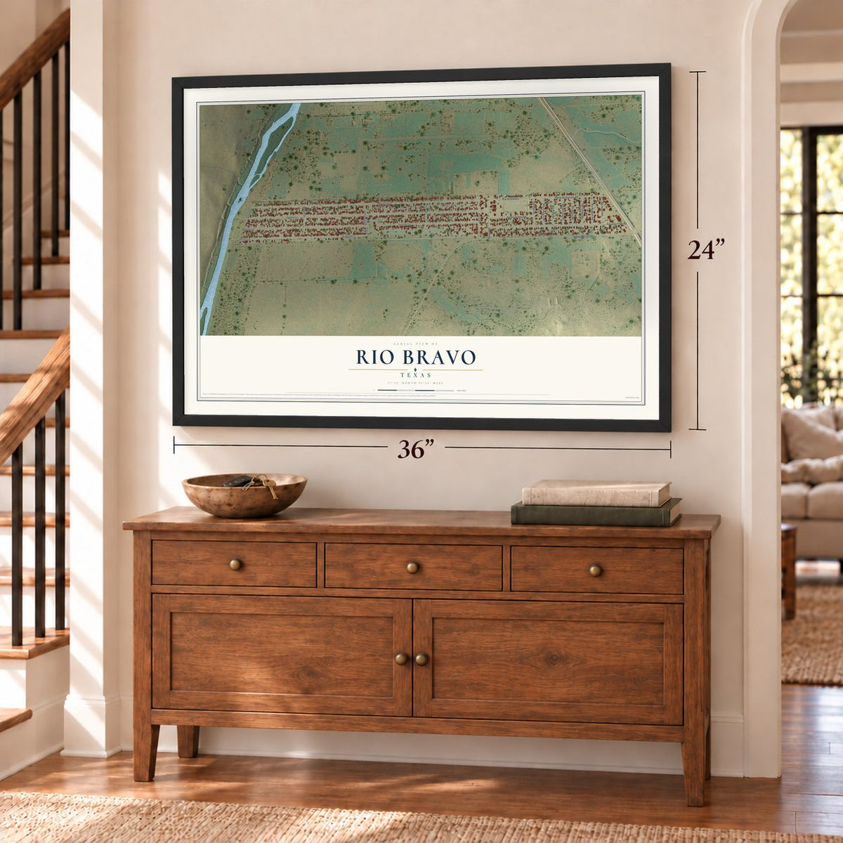 Rio Bravo, Texas map, 24 x 36 inch print in a black frame above a dresser by a staircase