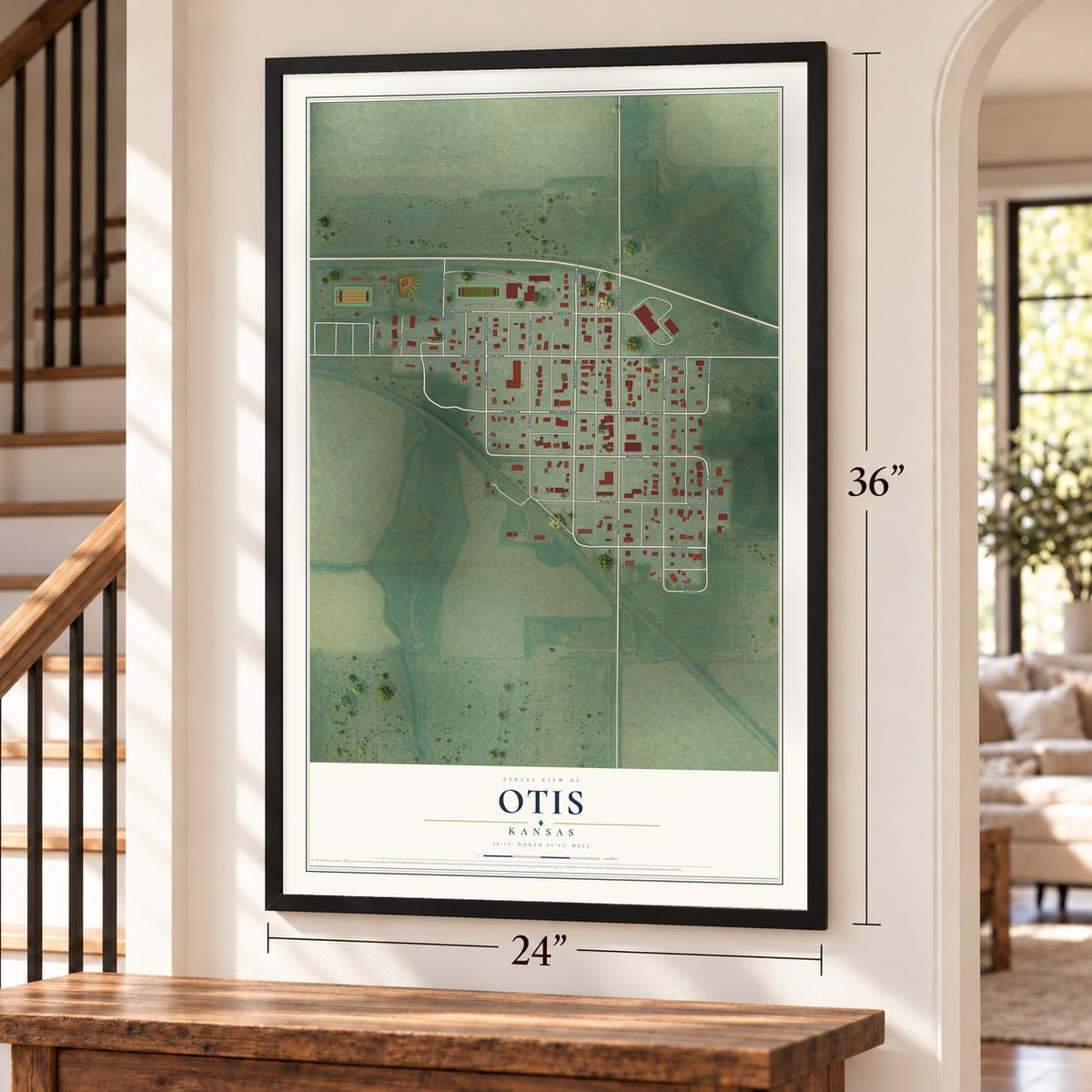 Otis, Kansas map, 24 x 36 inch print in a black frame by a staircase