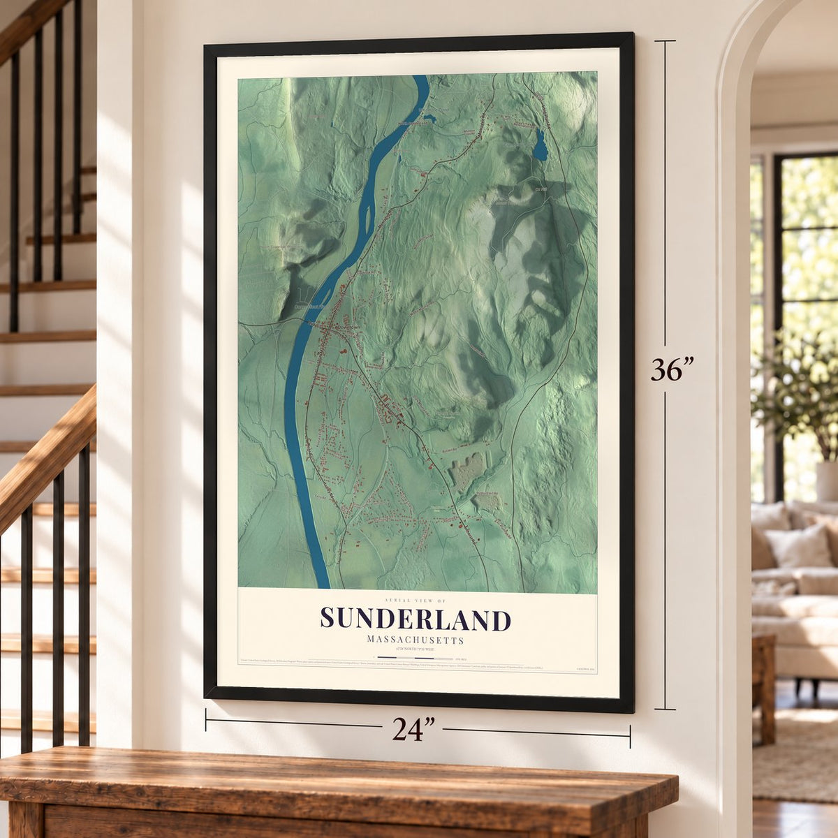 Sunderland, Massachusetts map, 24 x 36 inch print in a black frame by a staircase