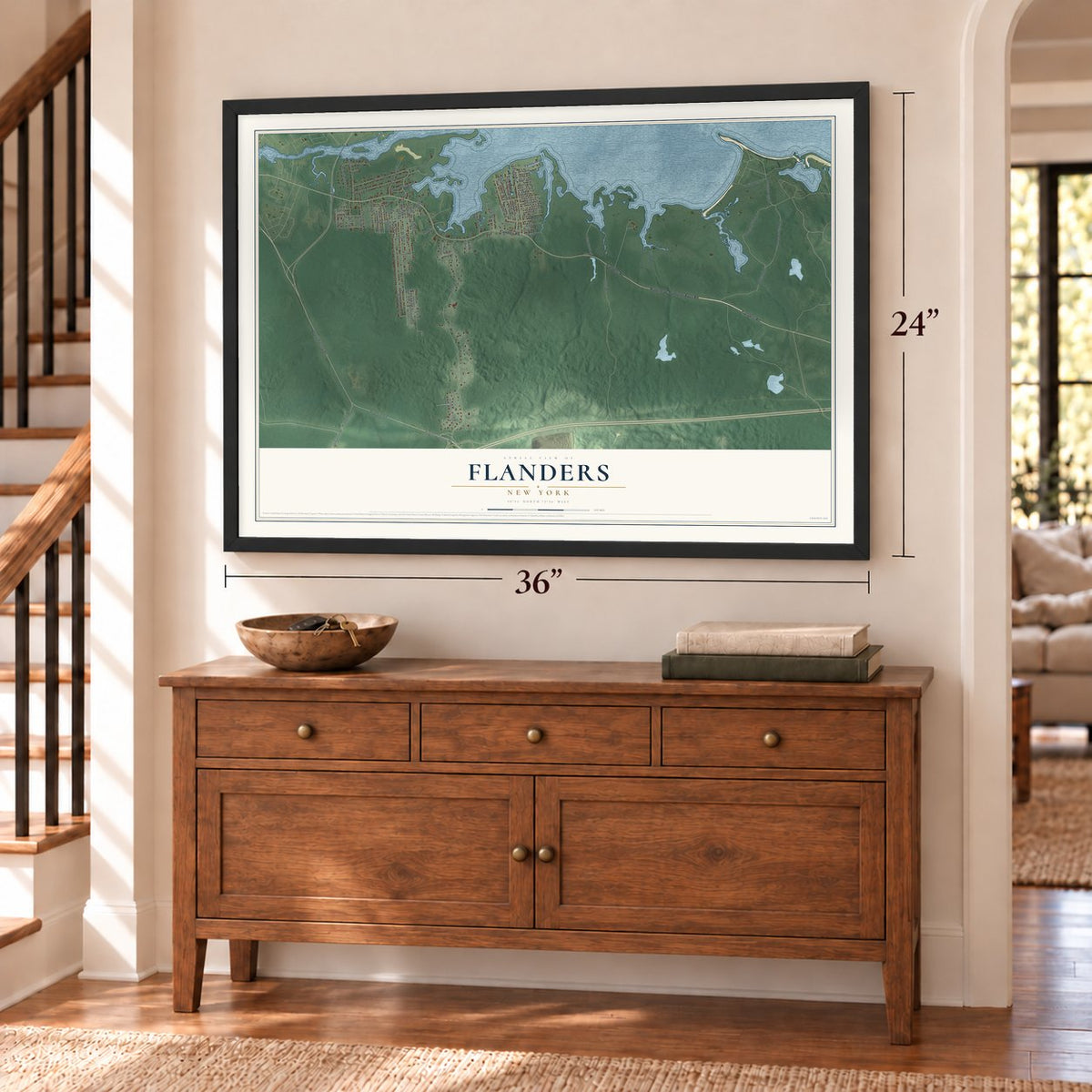 Flanders, New York map, 24 x 36 inch print in a black frame above a dresser by a staircase