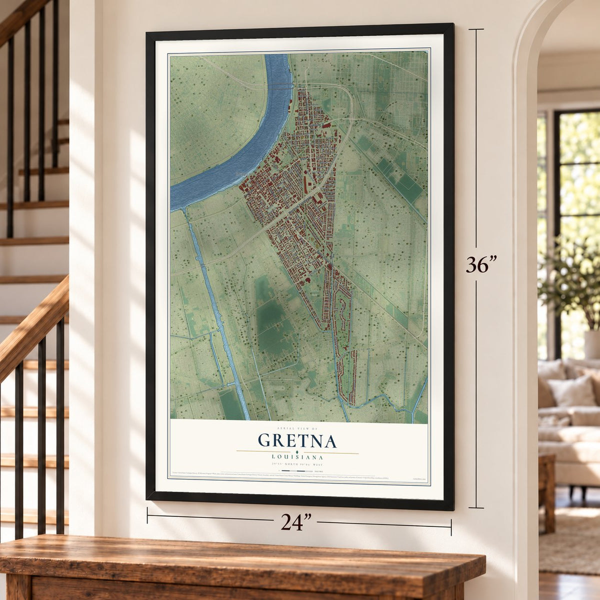 Gretna, Louisiana map, 24 x 36 inch print in a black frame by a staircase