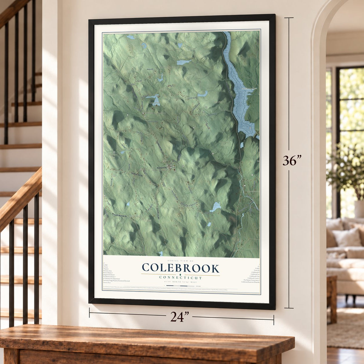 Colebrook, Connecticut map, 24 x 36 inch print in a black frame by a staircase