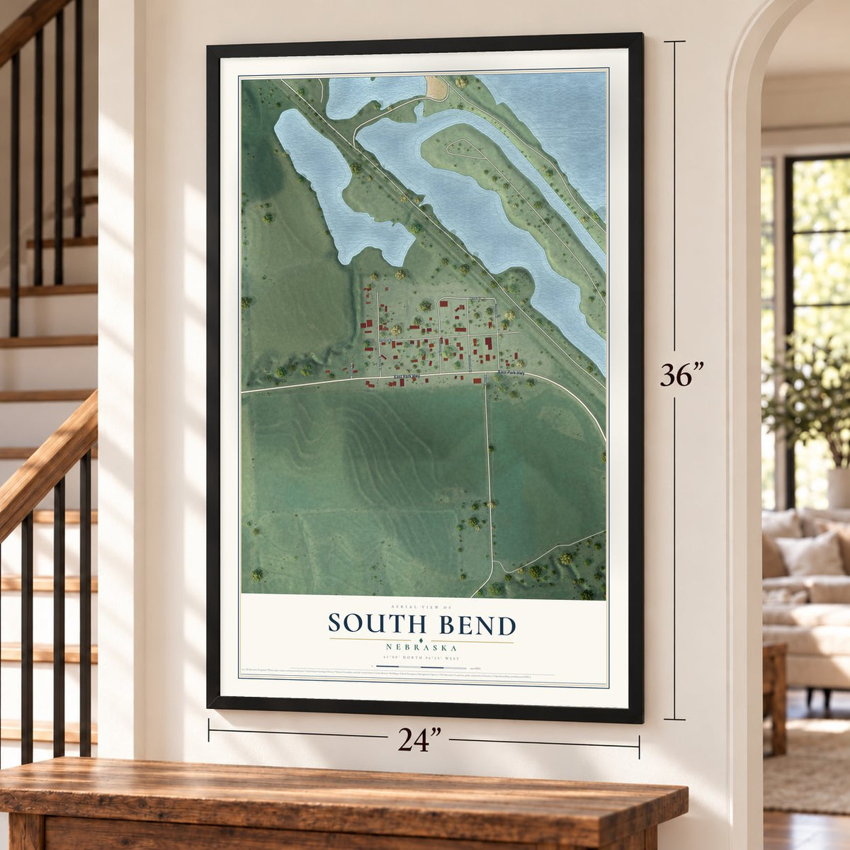 South Bend, Nebraska map, 24 x 36 inch print in a black frame by a staircase