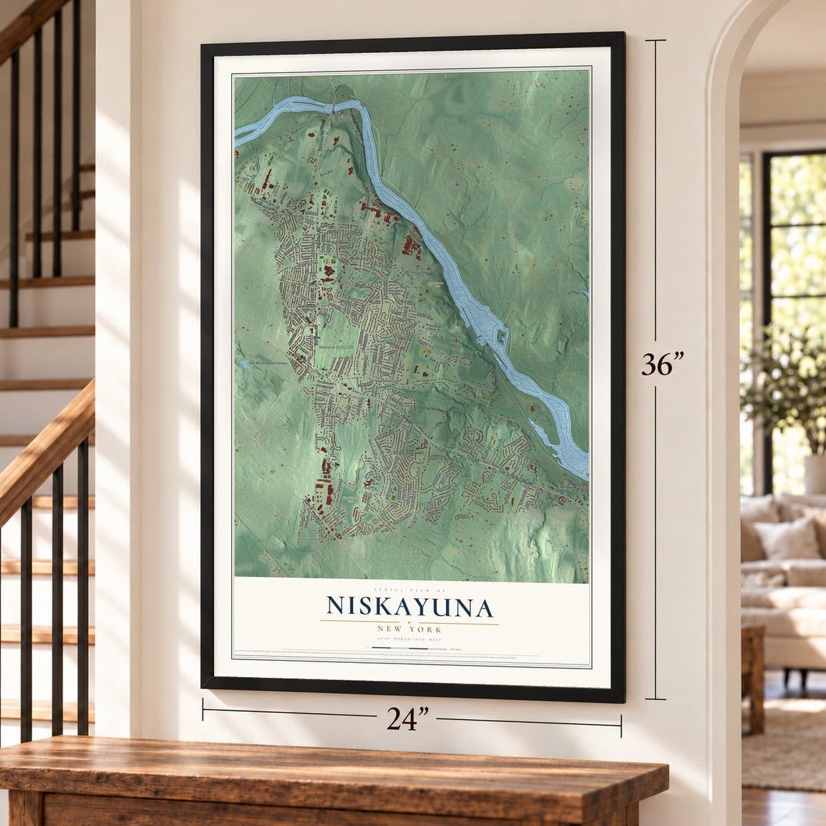 Niskayuna, New York map, 24 x 36 inch print in a black frame by a staircase