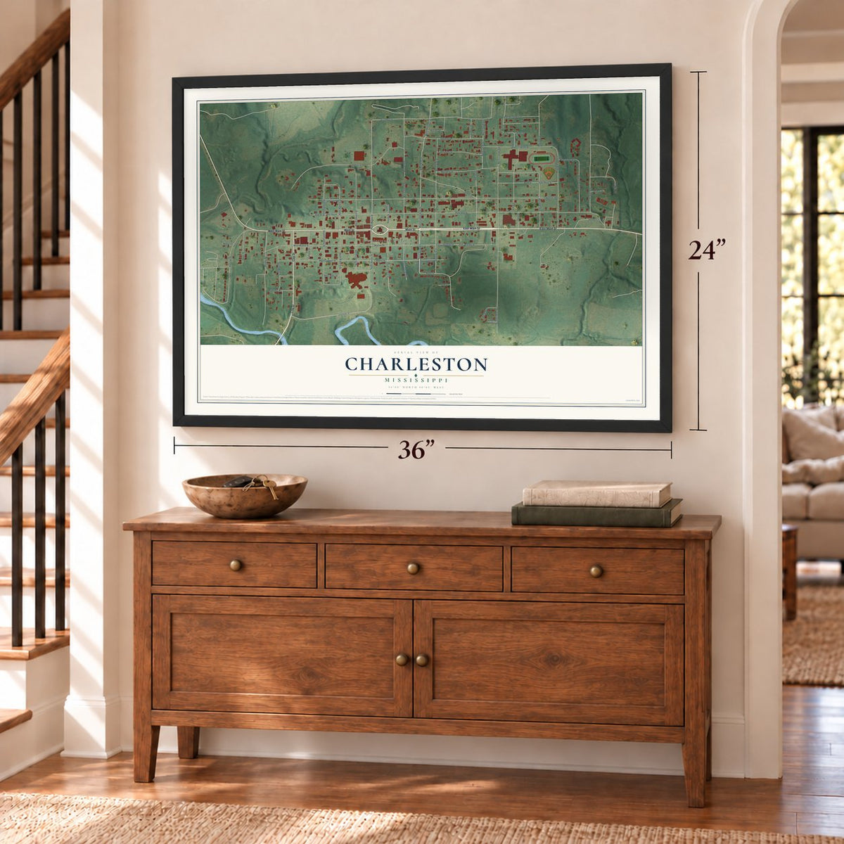 Charleston, Mississippi map, 24 x 36 inch print in a black frame above a dresser by a staircase