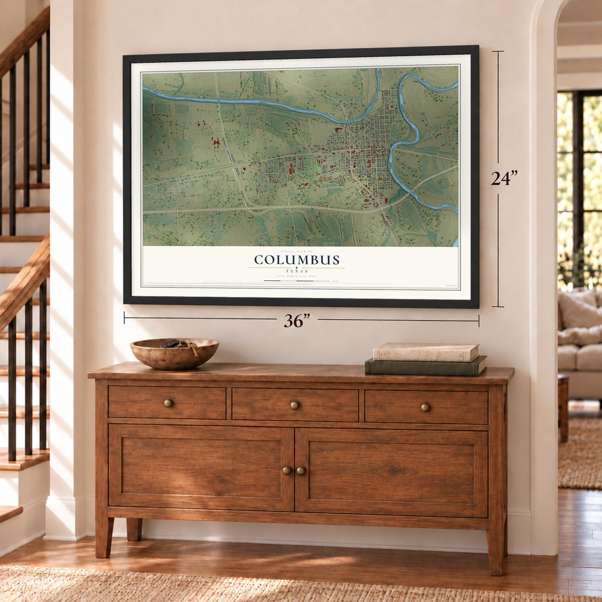 Columbus, Texas map, 24 x 36 inch print in a black frame above a dresser by a staircase