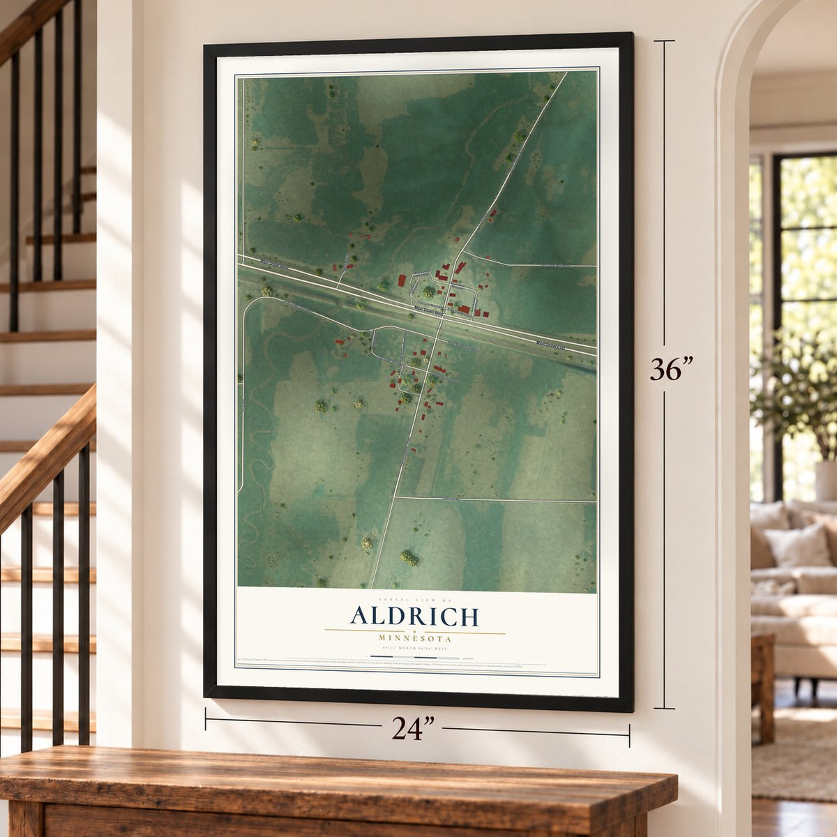 Aldrich, Minnesota map, 24 x 36 inch print in a black frame by a staircase