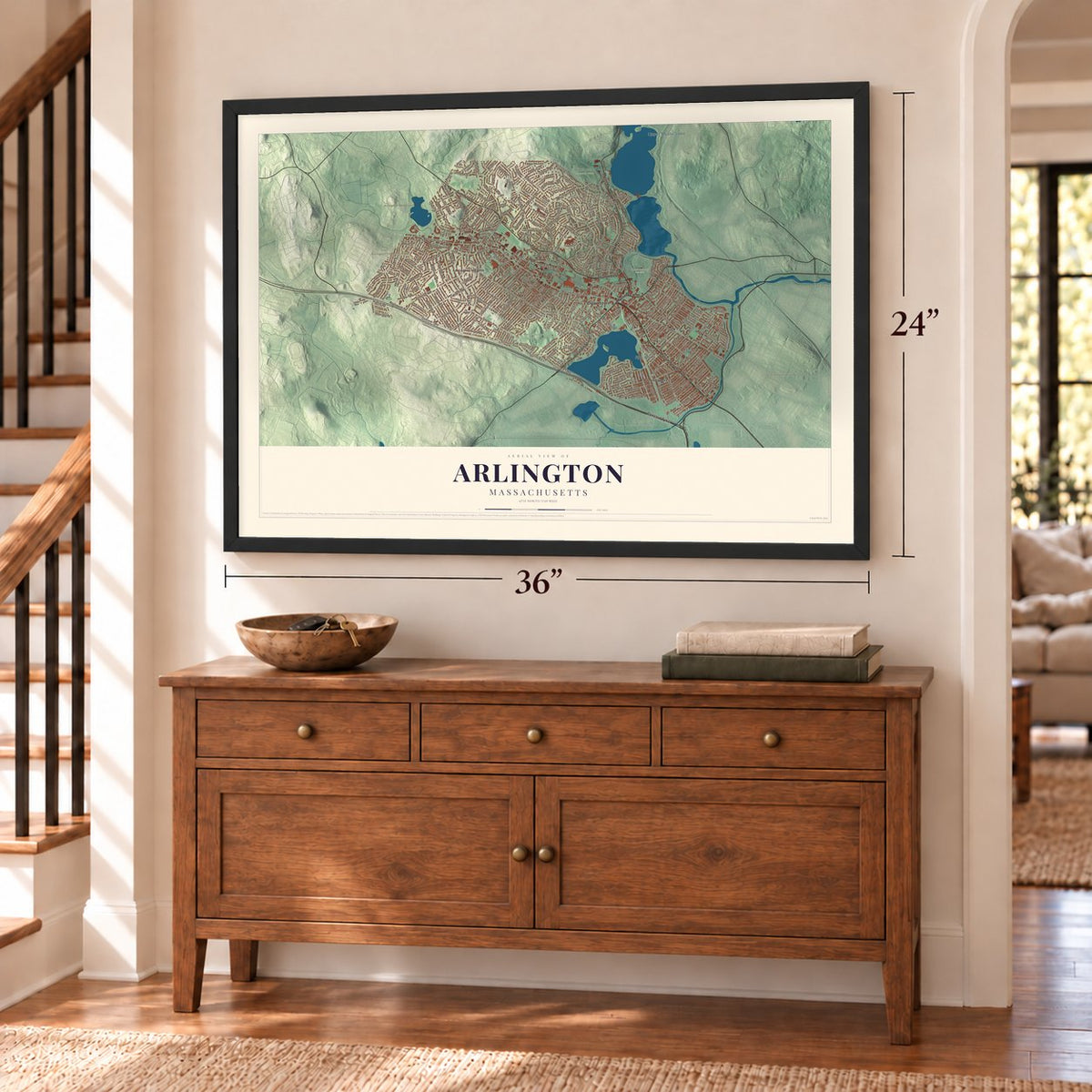 Arlington, Massachusetts map, 24 x 36 inch print in a black frame above a dresser by a staircase