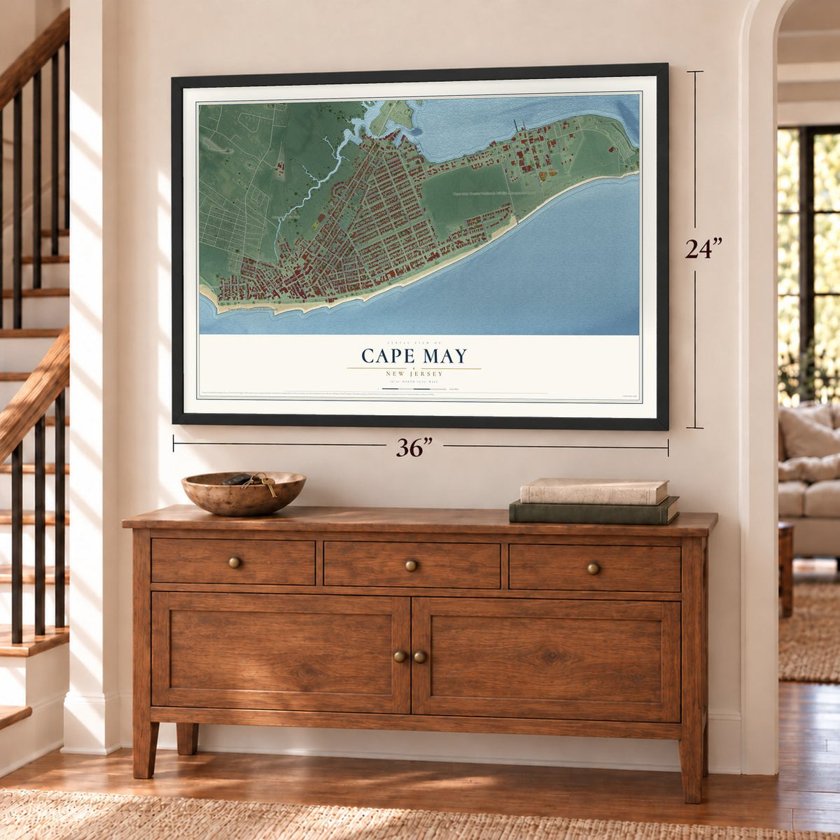 Cape May, New Jersey map, 24 x 36 inch print in a black frame above a dresser by a staircase
