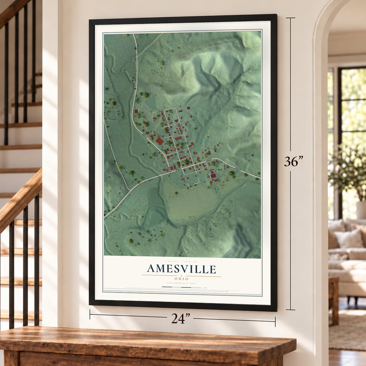 Amesville, Ohio map, 24 x 36 inch print in a black frame by a staircase