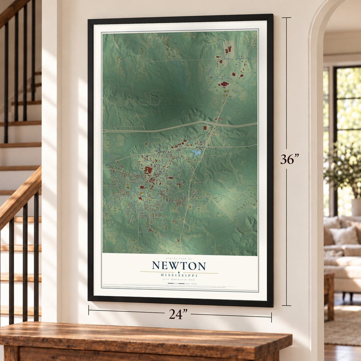 Newton, Mississippi map, 24 x 36 inch print in a black frame by a staircase