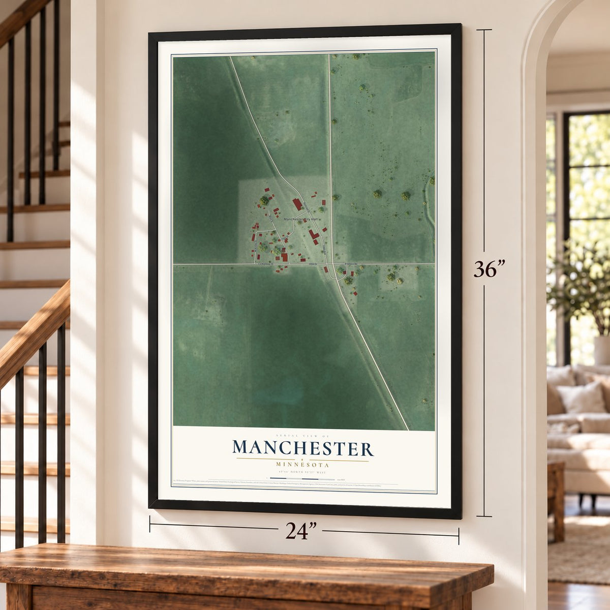 Manchester, Minnesota map, 24 x 36 inch print in a black frame by a staircase