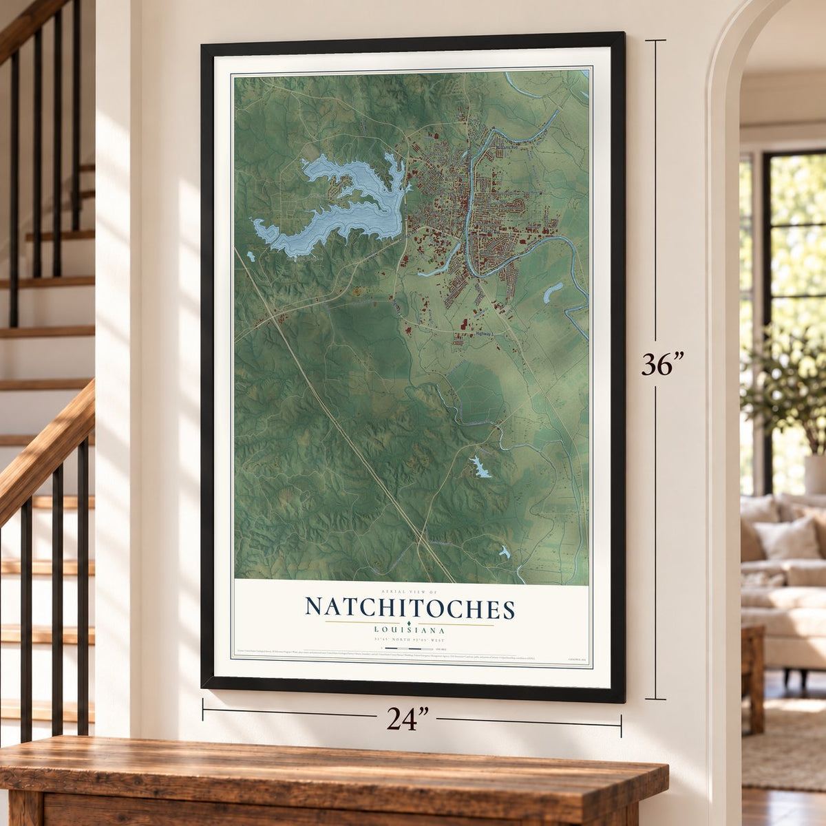 Natchitoches, Louisiana map, 24 x 36 inch print in a black frame by a staircase