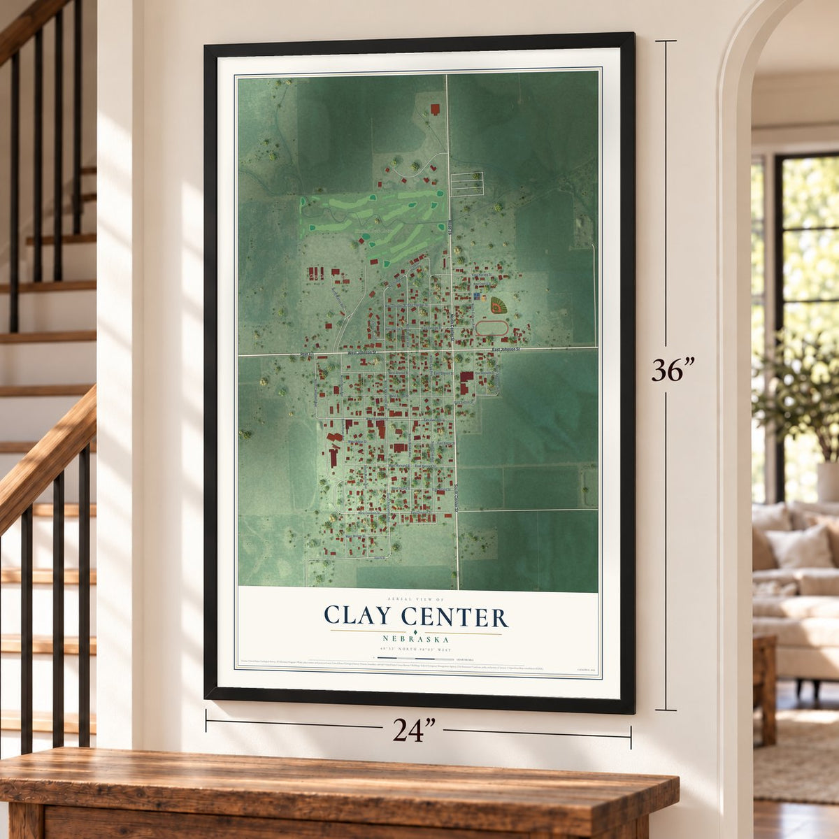 Clay Center, Nebraska map, 24 x 36 inch print in a black frame by a staircase