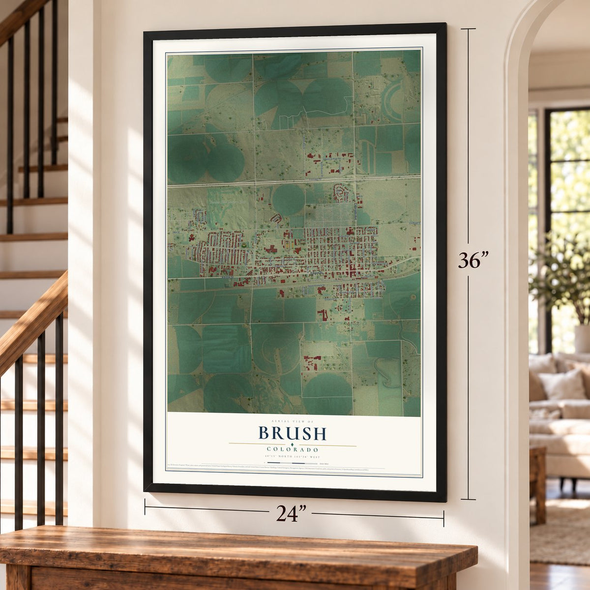 Brush, Colorado map, 24 x 36 inch print in a black frame by a staircase