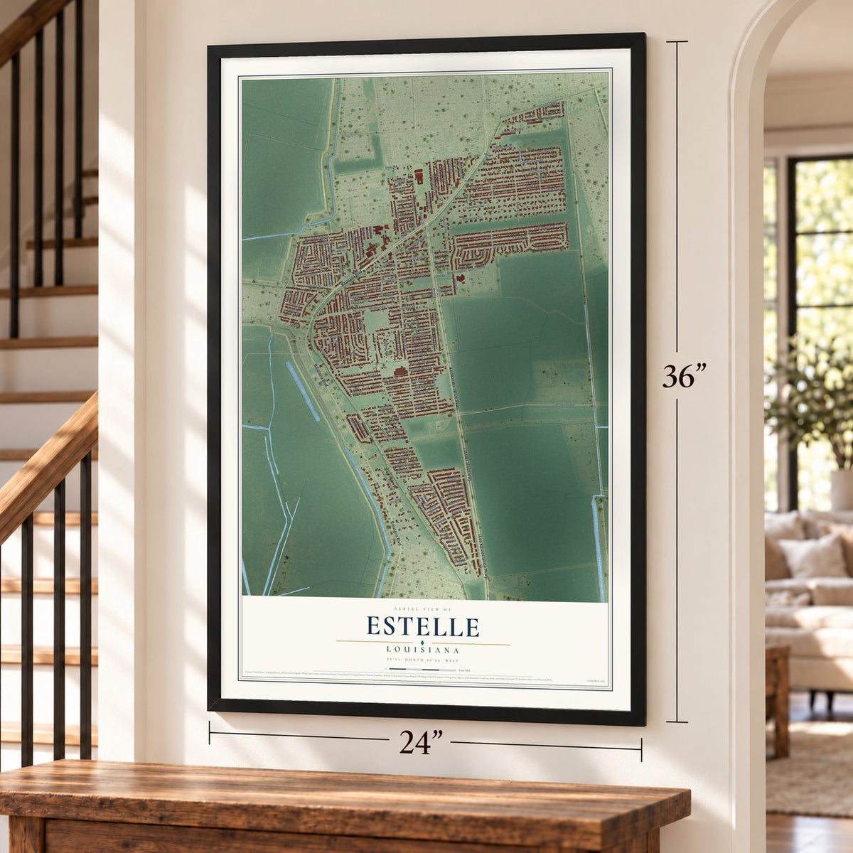 Estelle, Louisiana map, 24 x 36 inch print in a black frame by a staircase