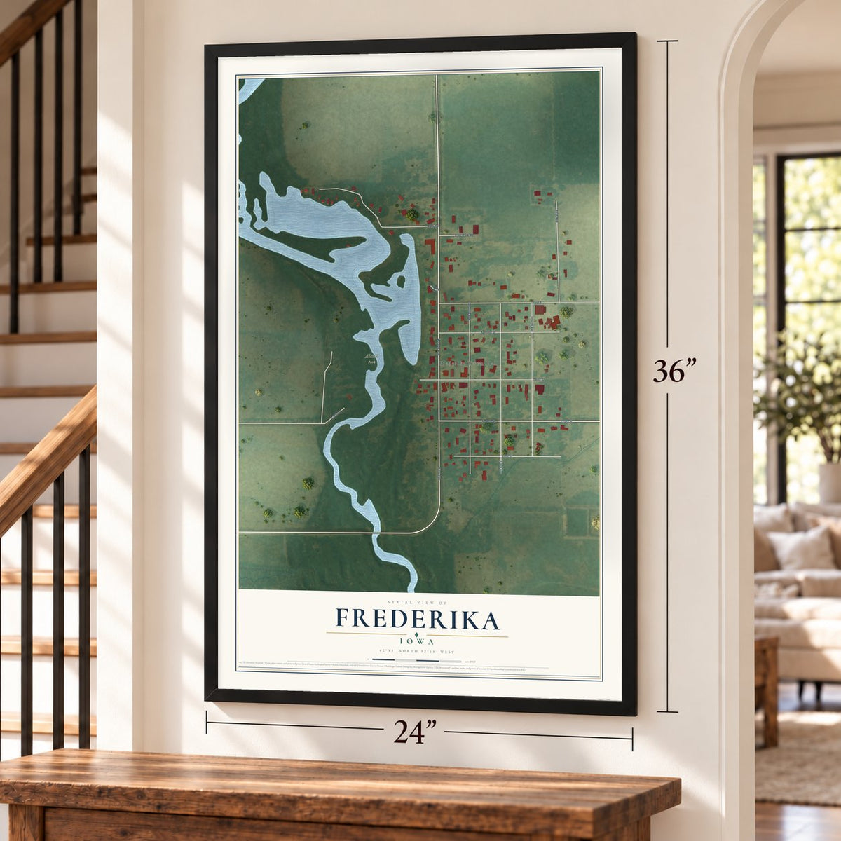 Frederika, Iowa map, 24 x 36 inch print in a black frame by a staircase
