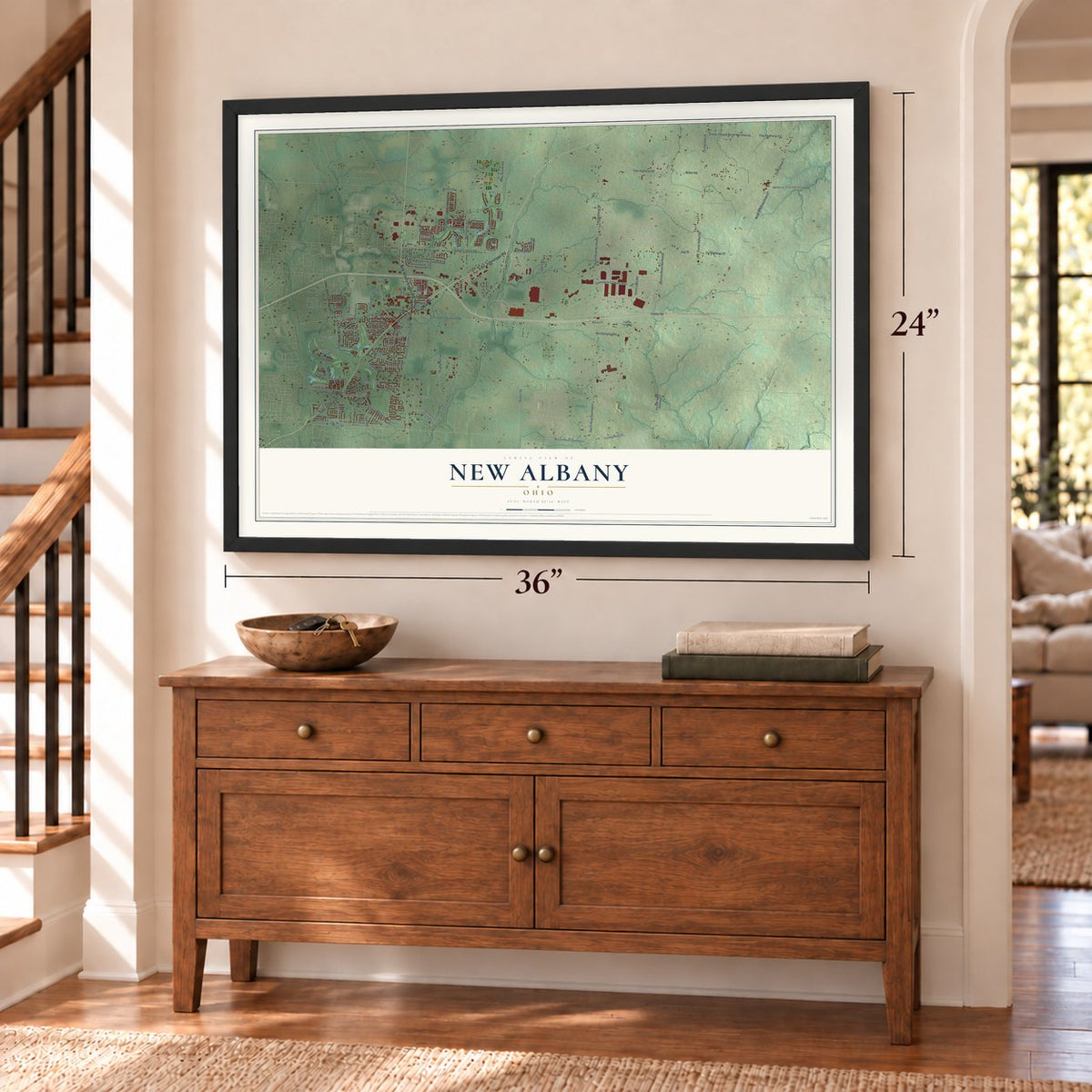 New Albany, Ohio map, 24 x 36 inch print in a black frame above a dresser by a staircase