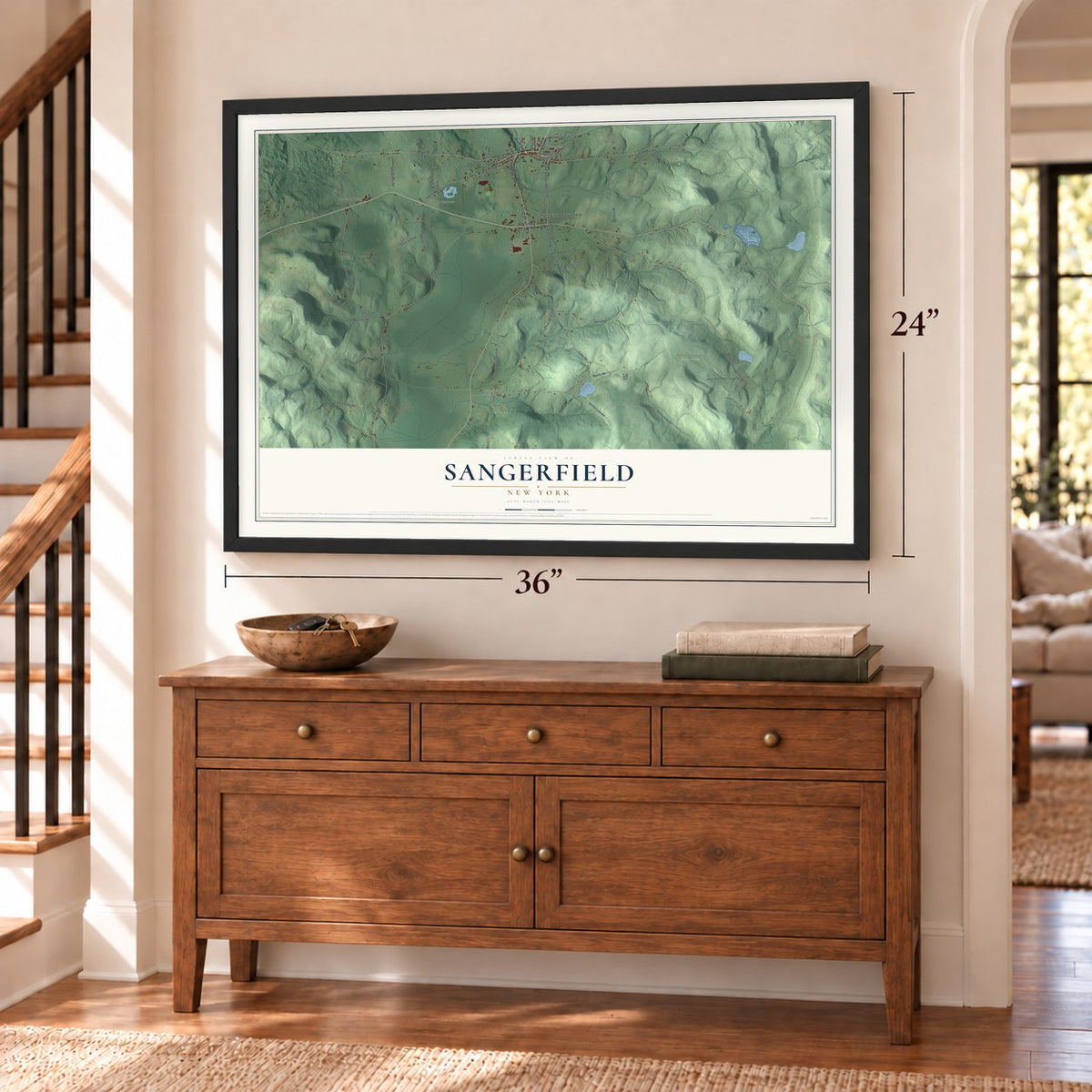 Sangerfield, New York map, 24 x 36 inch print in a black frame above a dresser by a staircase