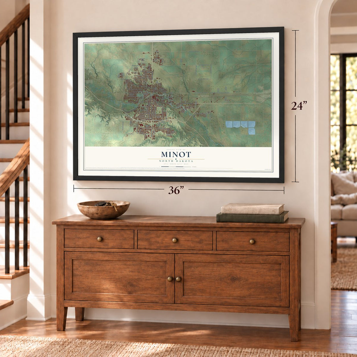 Minot, North Dakota map, 24 x 36 inch print in a black frame above a dresser by a staircase