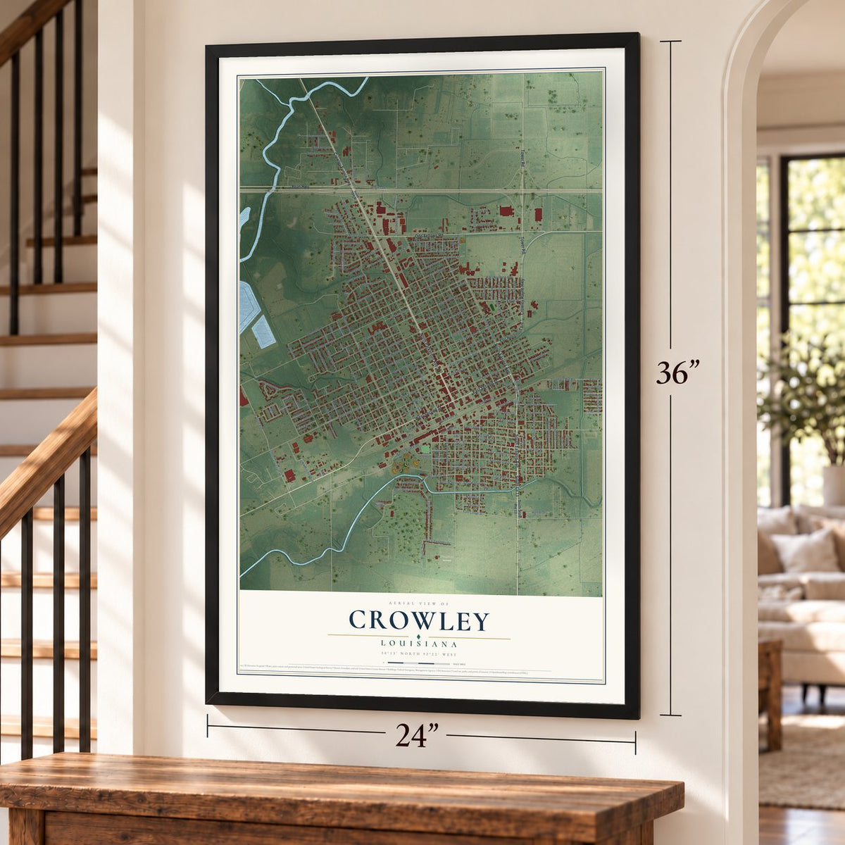 Crowley, Louisiana map, 24 x 36 inch print in a black frame by a staircase
