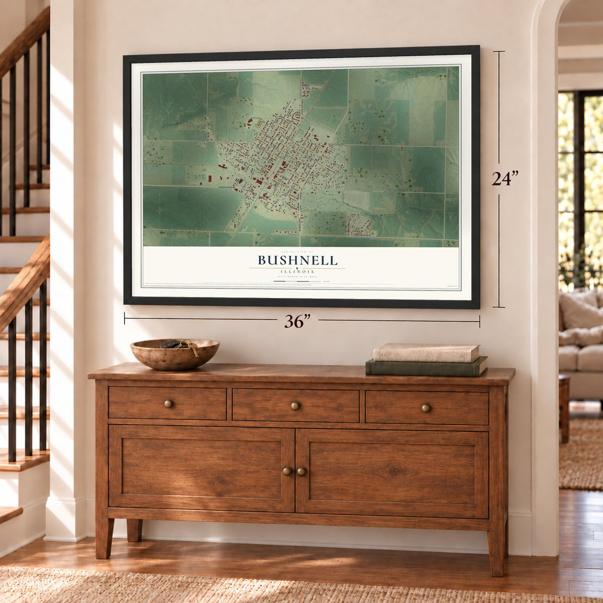 Bushnell, Illinois map, 24 x 36 inch print in a black frame above a dresser by a staircase