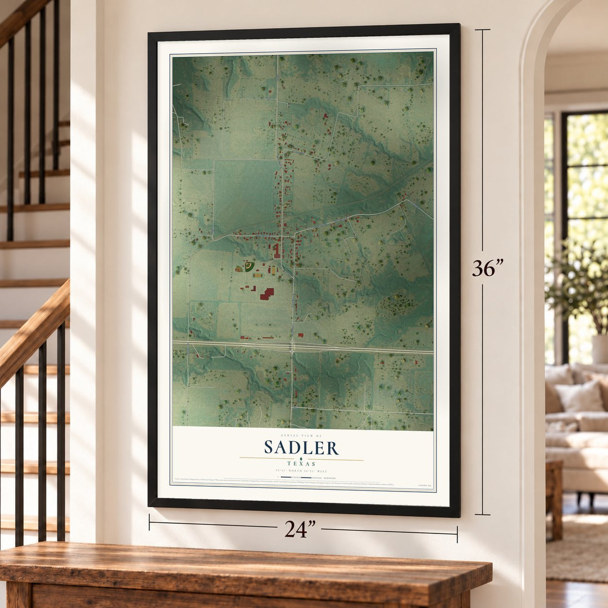 Sadler, Texas map, 24 x 36 inch print in a black frame by a staircase