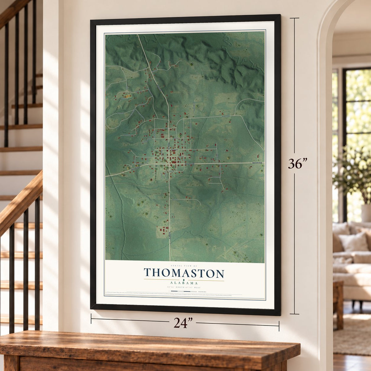 Thomaston, Alabama map, 24 x 36 inch print in a black frame by a staircase