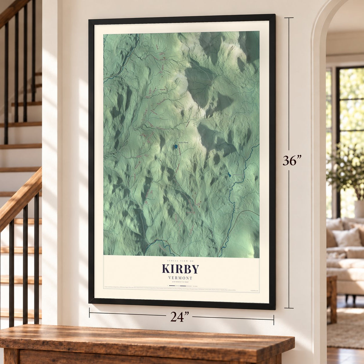Kirby, Vermont map, 24 x 36 inch print in a black frame by a staircase