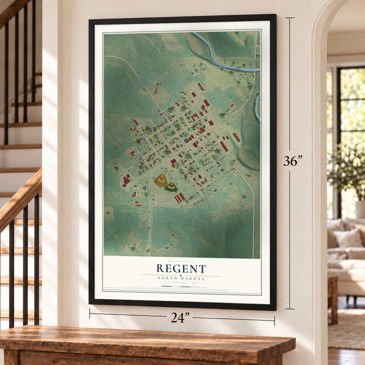 Regent, North Dakota map, 24 x 36 inch print in a black frame by a staircase