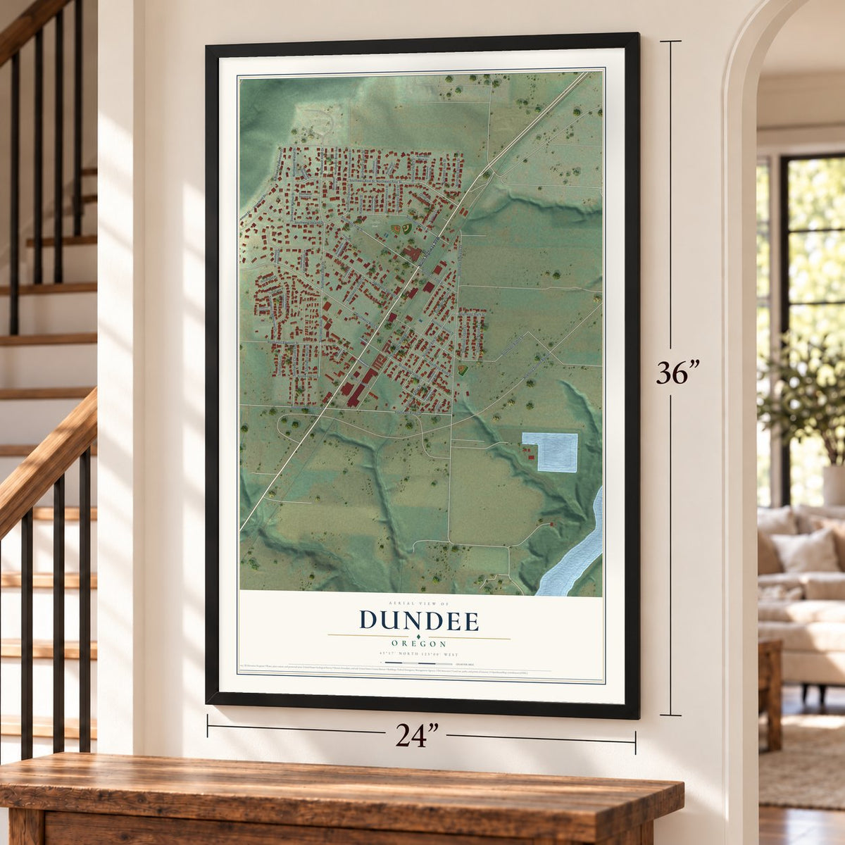 Dundee, Oregon map, 24 x 36 inch print in a black frame by a staircase