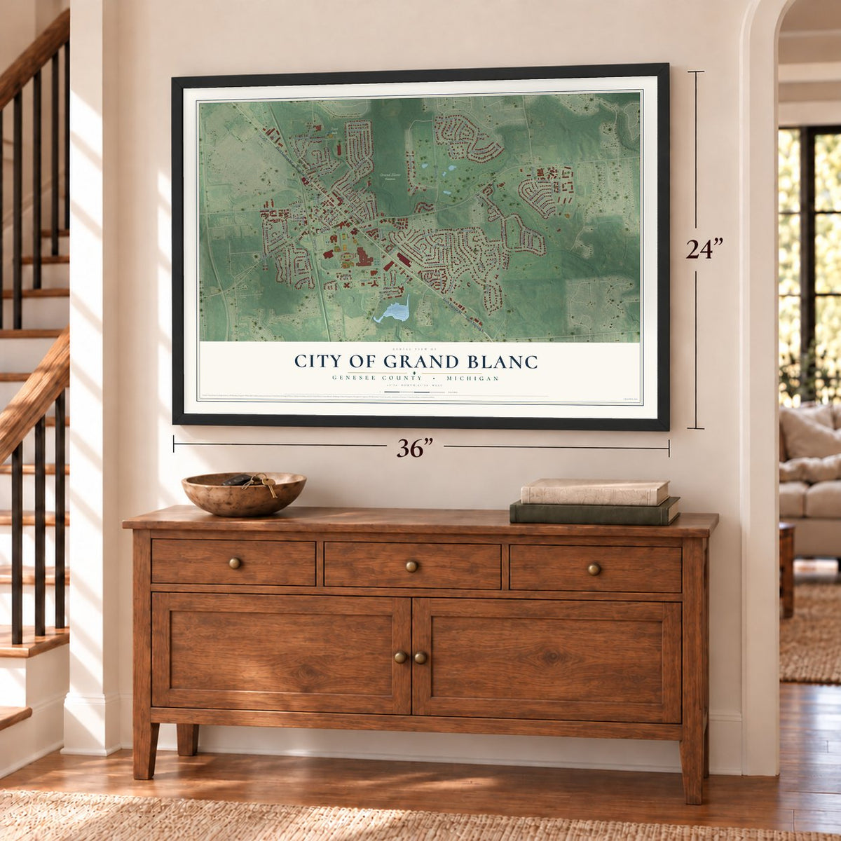Grand Blanc, Michigan map, 24 x 36 inch print in a black frame above a dresser by a staircase
