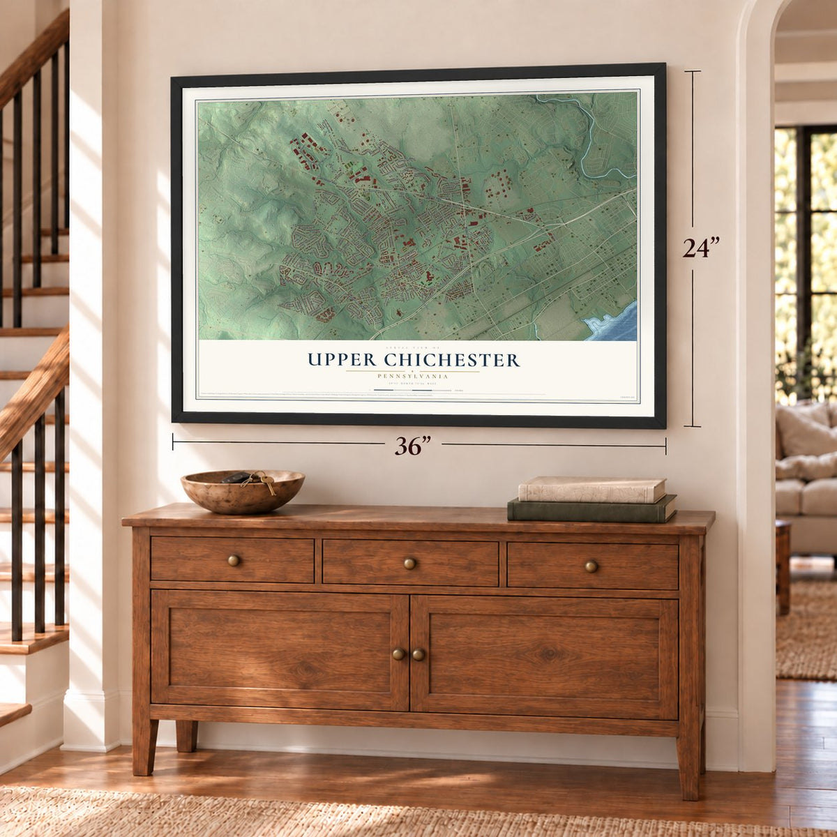 Upper Chichester, Pennsylvania map, 24 x 36 inch print in a black frame above a dresser by a staircase